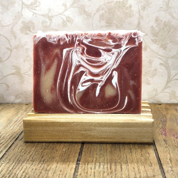 Vero Verde soap - a red and gold soap with an ice blue swirl through it