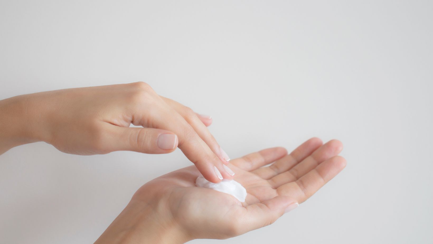 handmade skincare woman applying lotion