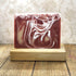 Vero Verde soap - a red and gold soap with an ice blue swirl through it